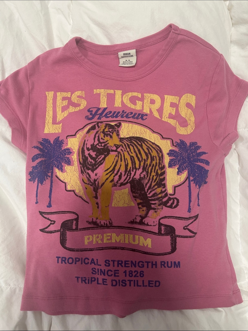 Urban Outfitters Pink Les Tigres Graphic Tee with Yellow & Purple Accents